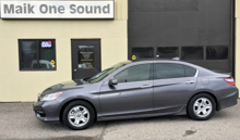 Grey 2017 Honda Accord Hybrid with professional window tint